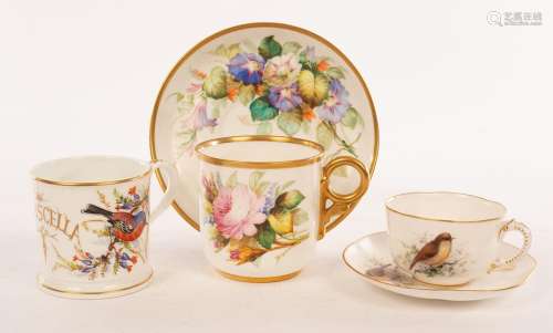 A Royal Worcester cup and saucer painted brightly coloured f...