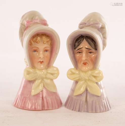 Two Royal Worcester candle snuffers, characters from Dickens...