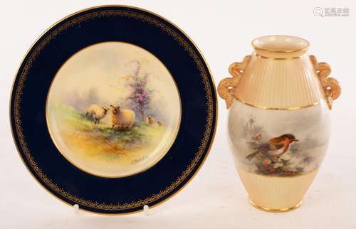 A Royal Worcester vase painted a robin in holly by H Stinton...