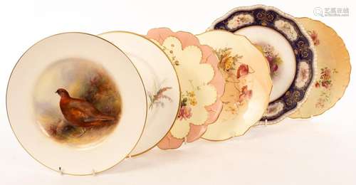 A Royal Worcester plate finely painted a grouse by Harry Dav...