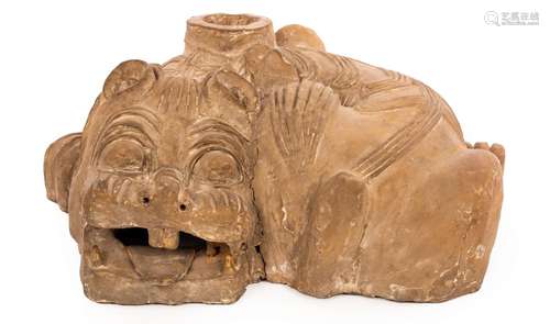 A Chinese earthenware Chimera, Han dynasty, in a lying posit...