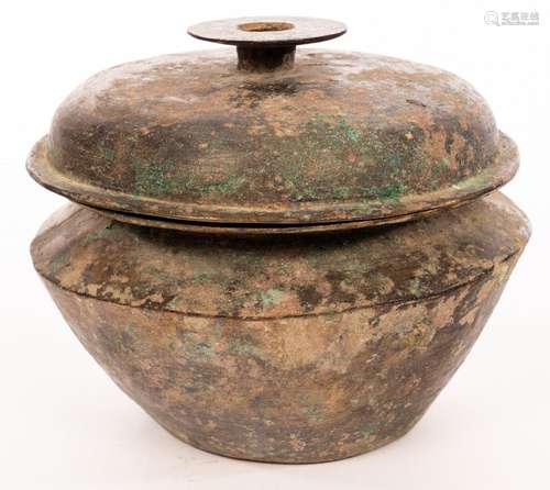 A Chinese bronze lidded dish, Han dynasty, of circular shape...