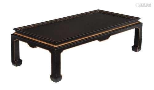 A black painted and parcel gilt low centre table in Chinoise...