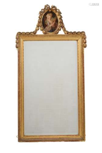 A giltwood and composition wall mirror in late 18th century ...