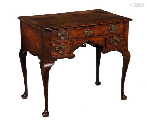 A George III oak side table or lowboy