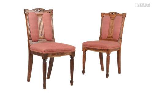 A set of nine late Victorian oak dining chairs