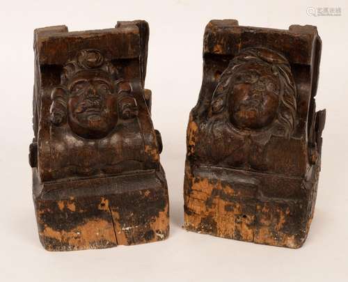 A pair of 17th Century architectural oak corbels carved as t...