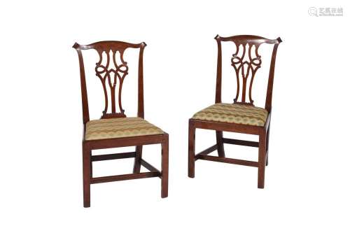 A pair of George III mahogany chairs