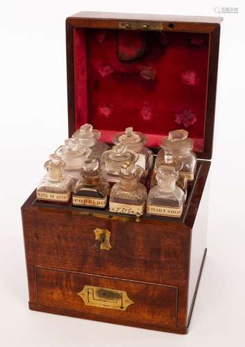 An apothecarys mahogany cabinet, 19th Century, fitted glass ...