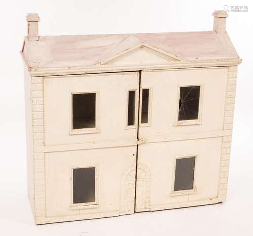 A Victorian dolls house, the four rooms enclosed by a pair o...