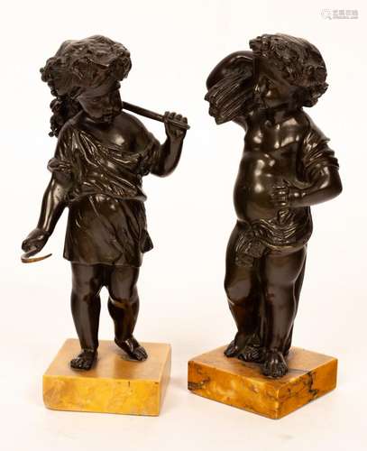 A pair of bronze putto, the harvesters, both raised on varie...