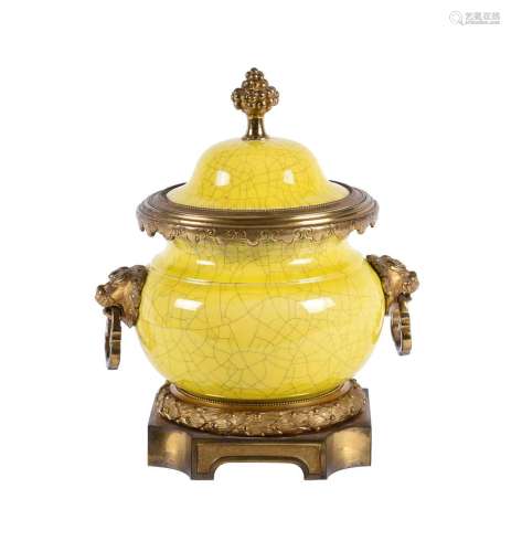 A Continental yellow crackled glazed pottery and gilt metal ...