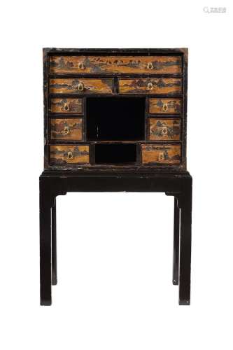 A black lacquer and parcel gilt japanned cabinet on stand