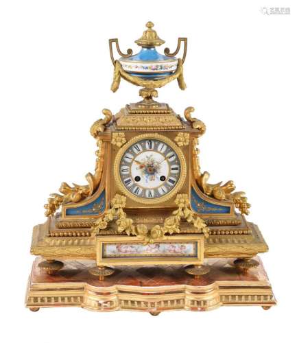 A French gilt metal and Sevres style porcelain inset mantel ...