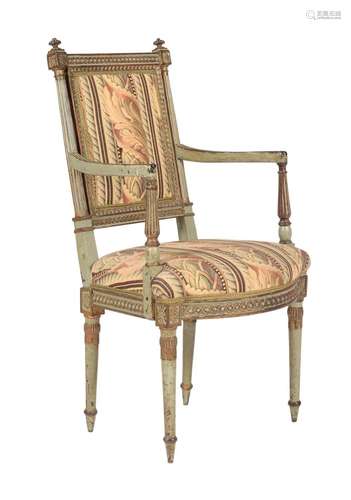 A green painted and parcel gilt open armchair in Louis XVI s...