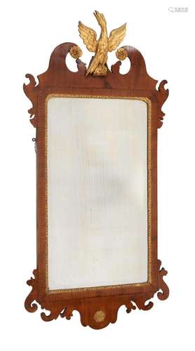 A George II walnut and parcel gilt wall mirror