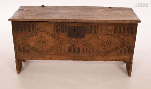 A James I small elm and oak fronted six plank chest,