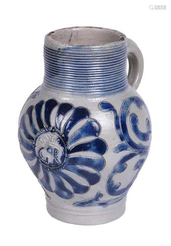 A Westerwald salt glazed stone baluster mug