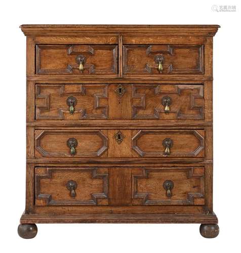 A Charles II oak chest of drawers