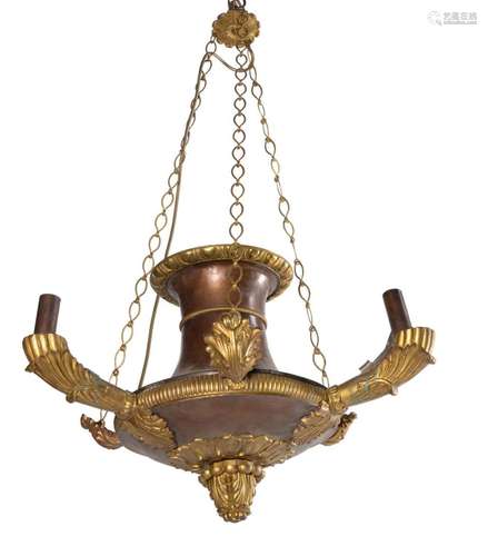 A gilt metal and coppered three branch ceiling light in Empi...