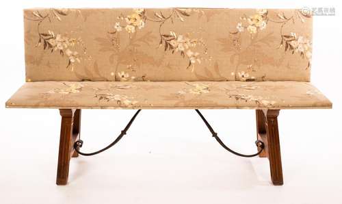 A Spanish Gothic folding bench with upholstered seat and rec...