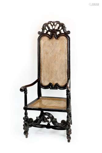 A William and Mary ebonised beech high back cane armchair, c...