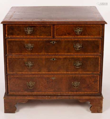 A George I figured walnut and holly banded chest,