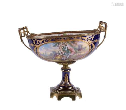 A large French pottery Sevres-style blue-ground navette-shap...