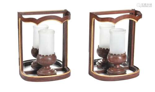 A pair of wall lanterns in Regency taste