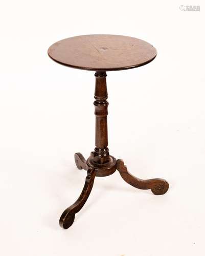 An early 18th Century oak tripod table,