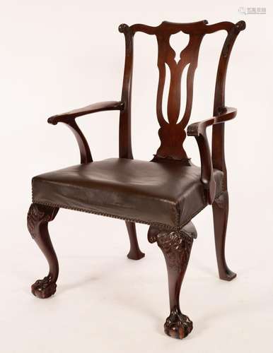 A George II style mahogany open armchair, with scroll crest ...