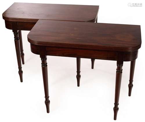 A pair of Regency mahogany fold-over card tables,