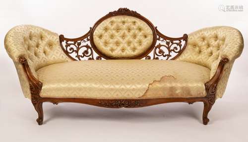 A Victorian two-chair back sofa, deep buttoned with oval bac...