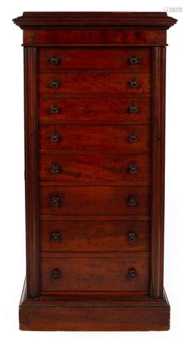 A mahogany Wellington chest with cushion top, fitted eight d...