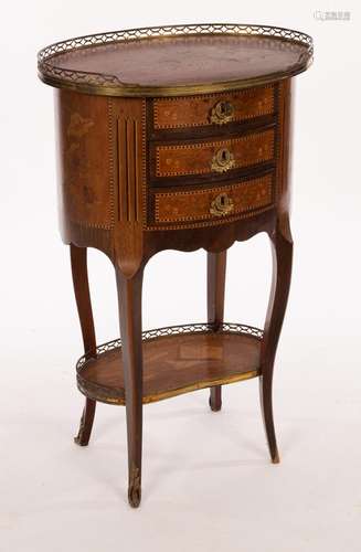 A French late 19th Century walnut and marquetry oval chest w...