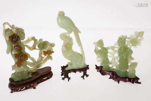 Set of three green jade figurines