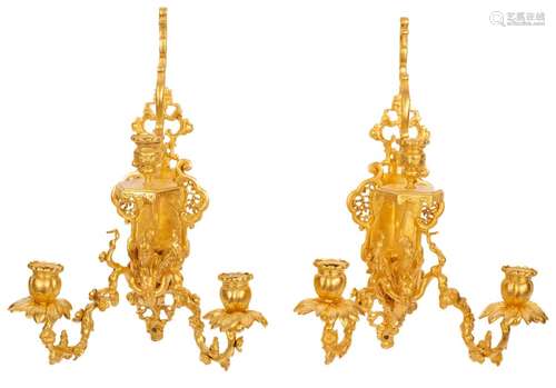 A pair of French re-gilded metal wall lights,