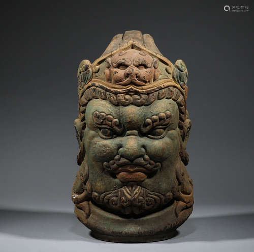 In ancient China, wooden painted Heavenly King Buddha head