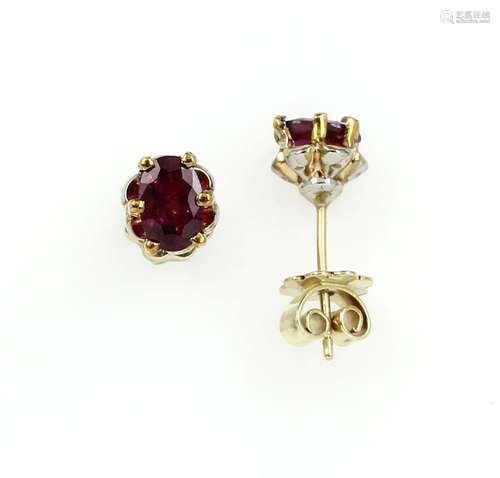 Pair of 14 kt gold earrings with rubies