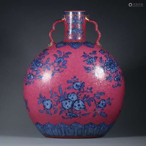 Blue and white flat bottle with red background