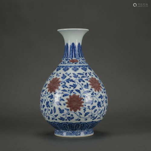 An underglaze-blue and copper-red 'floral' pear-shaped vase,...
