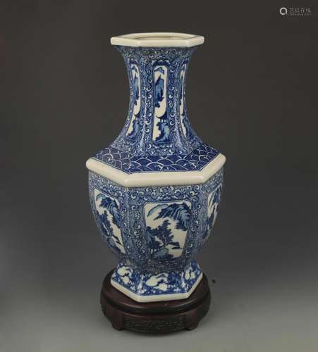 A BLUE AND WHITE LANDSCAPE PAINTING SIX SIDED VASE