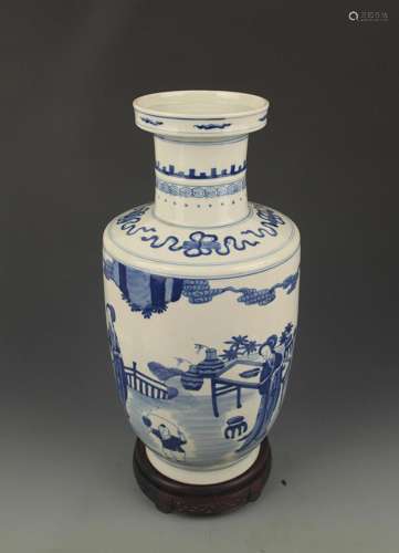 A BLUE AND WHITE BOY PAINTED PORCELAIN VASE