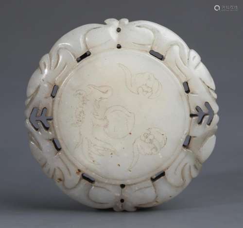 A ROUND WHITE JADE "GOOD FORTUNE" PENDANT