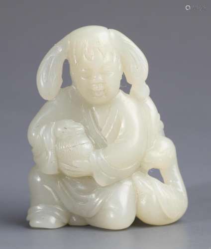 A FINELY CARVED WHITE JADE PENDANT IN FIGURE OF PLAYING BOY