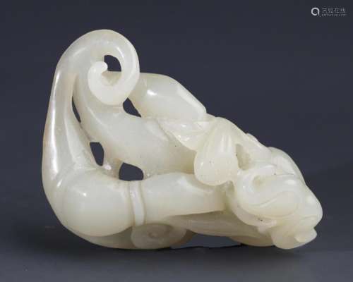 A HOLLOW CARVED LOTUS SHAPE HETIAN PALE CELADON JADE