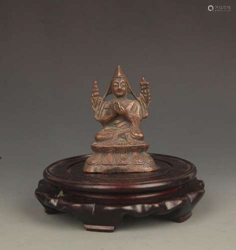 A FINELY CARVED BRONZE ZONGKABA FIGURE