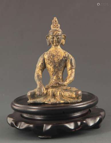 A BRONZE GILT AMITABHA FIGURE