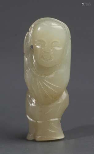 A FINE PALE CELADON JADE IN FIGURE OF BOY