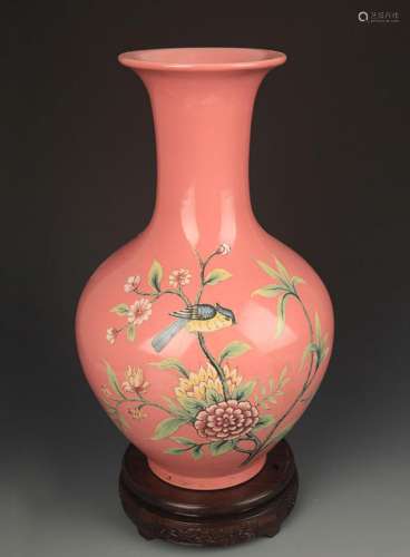 A CARMINE RED FAMILLE ROSE FLOWER AND BIRD VASE